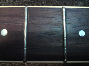 Worn frets; before. 